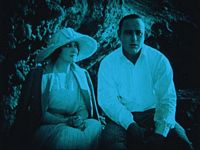 Frederick and Roy Stewart sitting on rocks