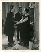 Film still from Smouldering Fires, with Frederick, Tully Marshall, and Malcolm McGregor