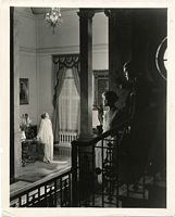 Film still Smouldering Fires, with Frederick, Laura LaPlante, and Malcolm McGregor