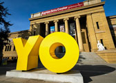 photo of "YO" in front of Cantor Arts Museum
