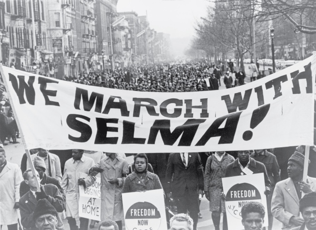 Demonstrators with We March with Selma sign