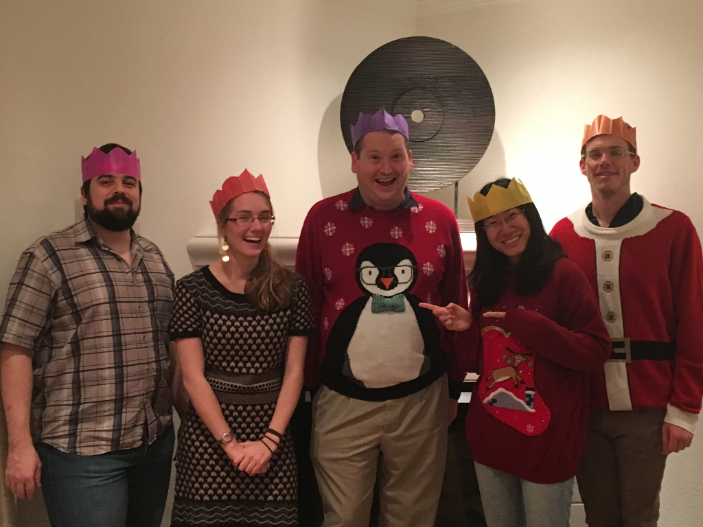 Photo of a group of people wearing Christmas clothing