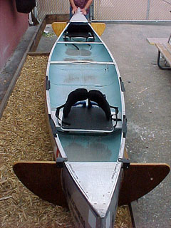 The seat easily attaches to standard canoes