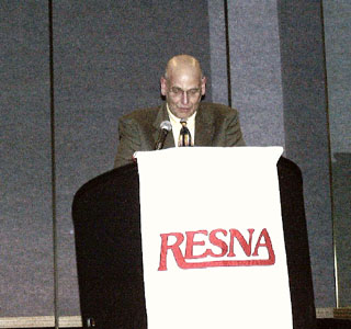 It's Simon Margolis' turn at the podium