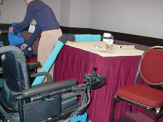 A robotic arm grabs a cup