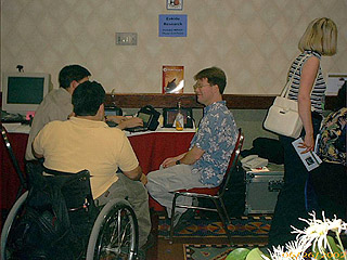 The back of Ramon Castillo and the profile of Bruce Fleming