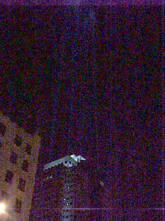 UFO beaming up entire building