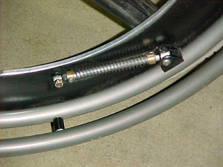 Close up of spring-loaded pushrim