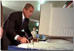 President Bush checking out an adapted computer