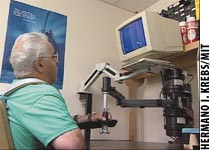 Photograph of subject undergoing robotic therapy