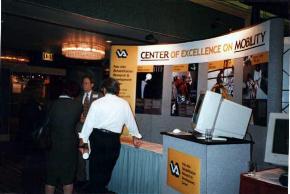 Chuck fielding questions at booth