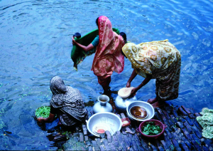 Women use fresh water to wash food and complete household chores.