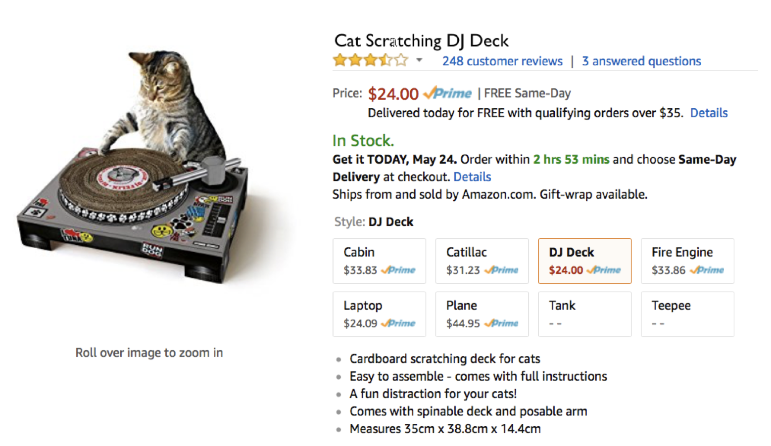 An image of a cat playing with a 'cat scratching dj deck'