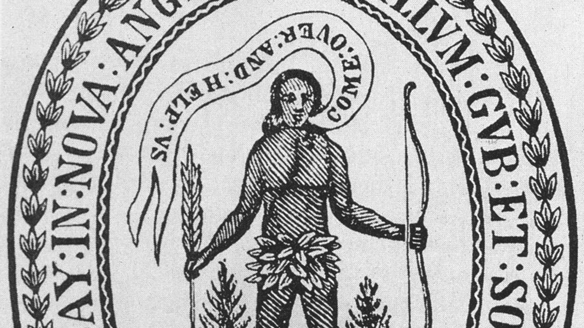 Seal of the Massachusetts Bay Colony. A historical black-and-white seal depicting a Native American figure holding a bow in the right hand and an arrow in the left, pointing downward. The figure is adorned with a skirt made of leaves and has long hair. A scroll above the figureâ€™s head contains the phrase â€œCome over and help us.â€