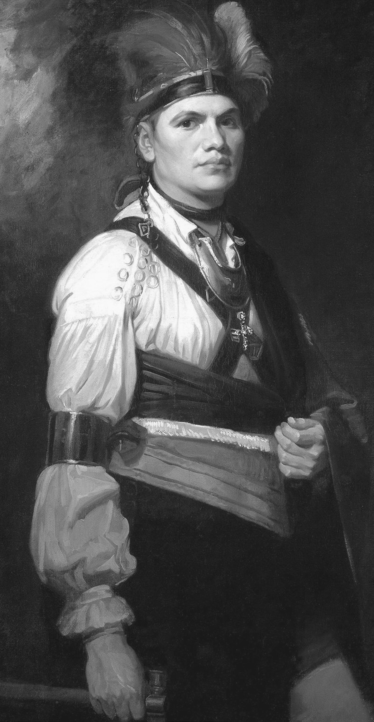 In this 1776 oil painting by George Romney, Mohawk leader Thayendanegea (Jospeh Brant) is wearing a white ruffled shirt, a Native American blanket, a silver gorget, and a plumed headdress, and is carrying a tomahawk.