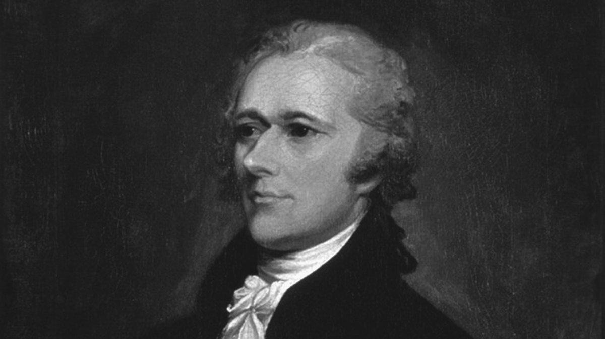 A close-up on the face from an 1806 portrait of Alexander Hamilton by John Trumbull. He wears a black coat and a white neck cloth, and has dark gray hair. He is turned toward the viewerâ€™s left and looks in that direction.