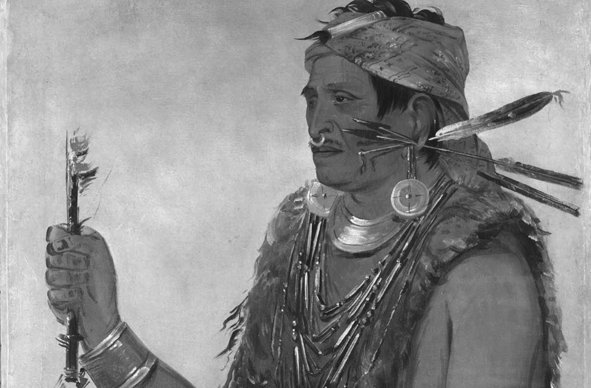 An oil portrait of Tenskwatawa in traditional Native American attire, including a metal nose ring, feathers piercing his earlobe, and many pieces of metal jewelry on his wrist, ears, and neck.