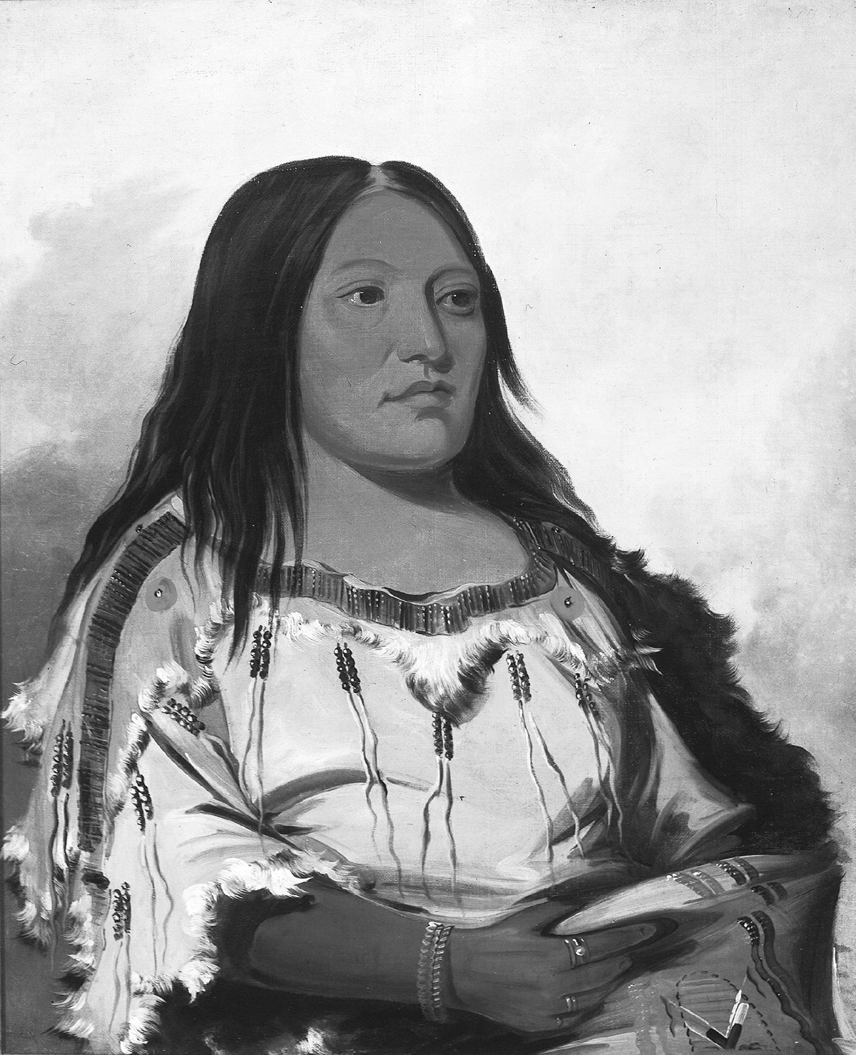 In 1832, George Catlin painted Eeh-nÃ­s-kim, Crystal Stone, wife of a Blackfoot leader. She wears buckskin decorated with beating and feathers. She has red paint on her forehead, and wears three rings and a double banded bracelet that appears to be gold.