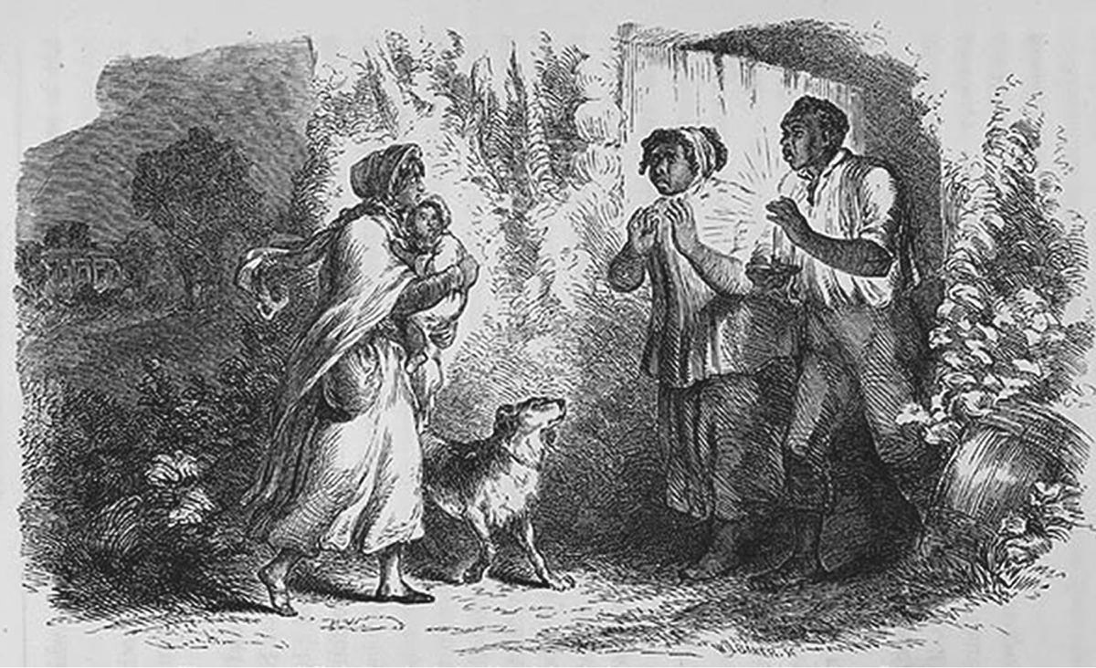 In this 1852 illustration by Hammatt Billings in Uncle Tomâ€™s Cabin, a woman holds a very young boy as she approaches a man and a woman on the right. Between the two groups is a dog, and the scene takes place in what looks like an untamed wooded area. All of the figures have worried expressions.