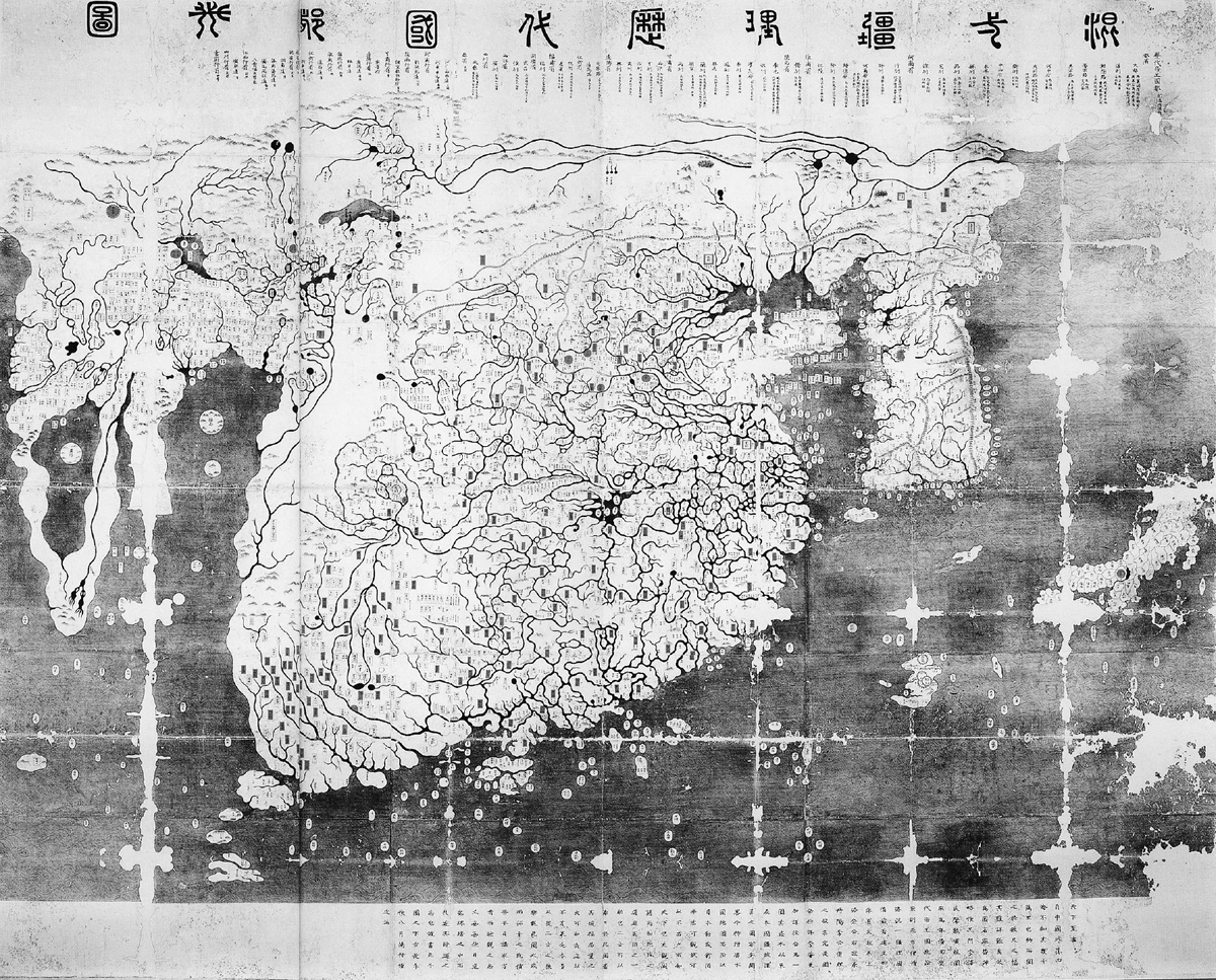 A Kangnido world map created in Korea in 1402 is painted on silk depicting the Old World, stretching from Africa and Europe in the West to Japan in the East. China is placed in the heart of the map, revealing an Asian centric worldview. The map highlights the capital cities of China, Korea, and Japan with red circles.
