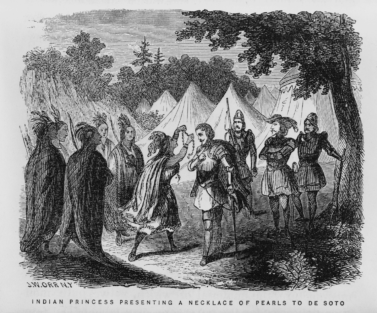 The image reflects a romanticized depiction of early contact between Indigenous peoples and European explorers. The black and white illustration shows a Native American woman presenting a necklace of pearls to Spanish explorer Hernando de Soto. The scene takes place outdoors near a group of tents, with a forest in the background. The woman is surrounded by other Native Americans, while de Soto stands among several armored Spanish soldiers. John William Orr, Indian Princess Presenting a Pearl Necklace to Hernando de Soto During His Journeys to South Carolina, 1858.