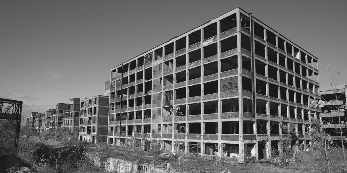 An abandoned, decaying factory complex.