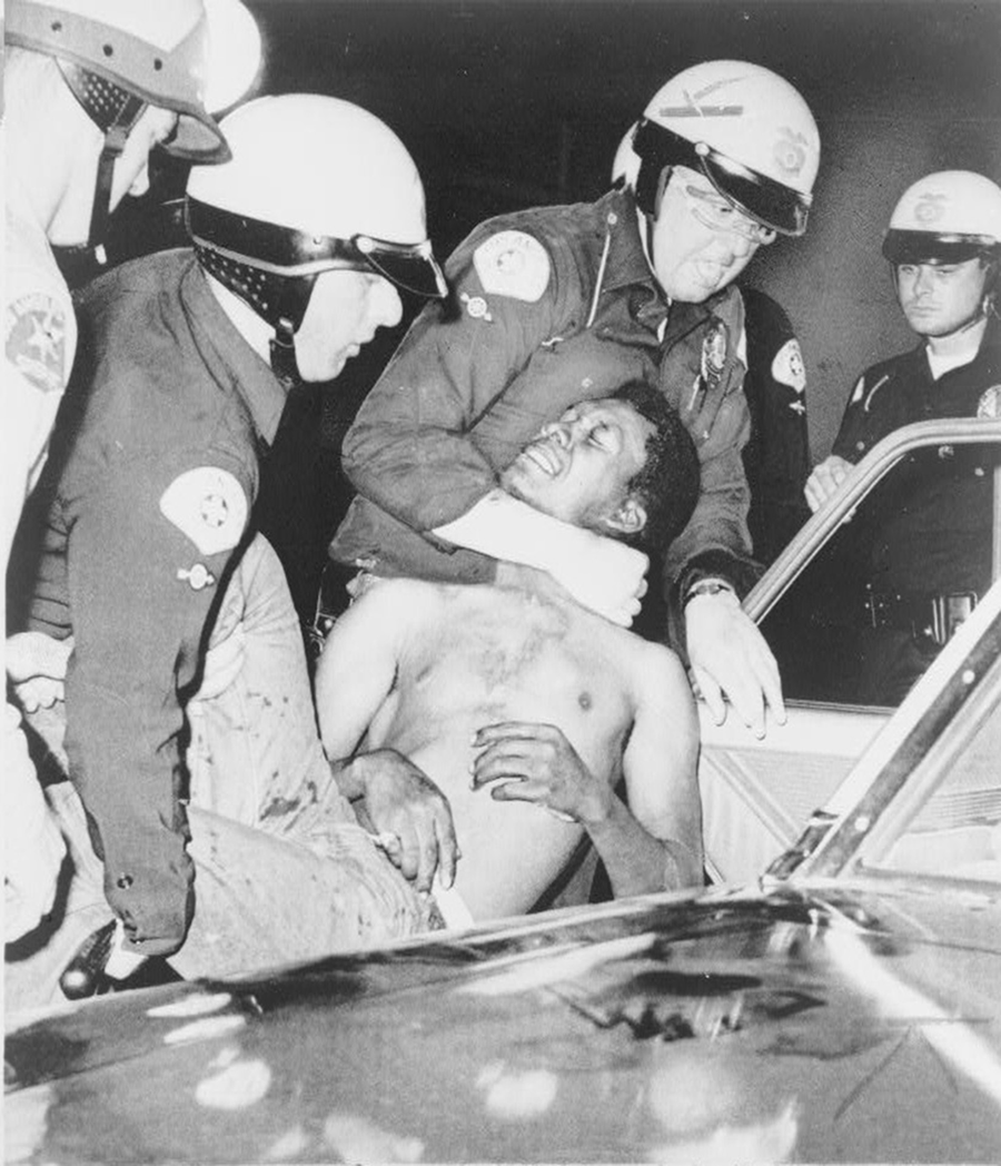 Los Angeles police violently arrest a man.