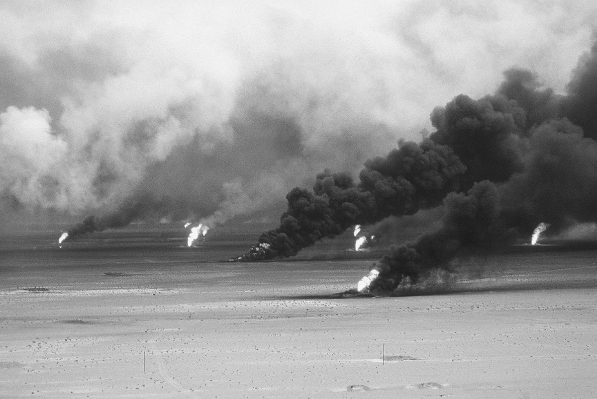 Oilfields burn in the desert.