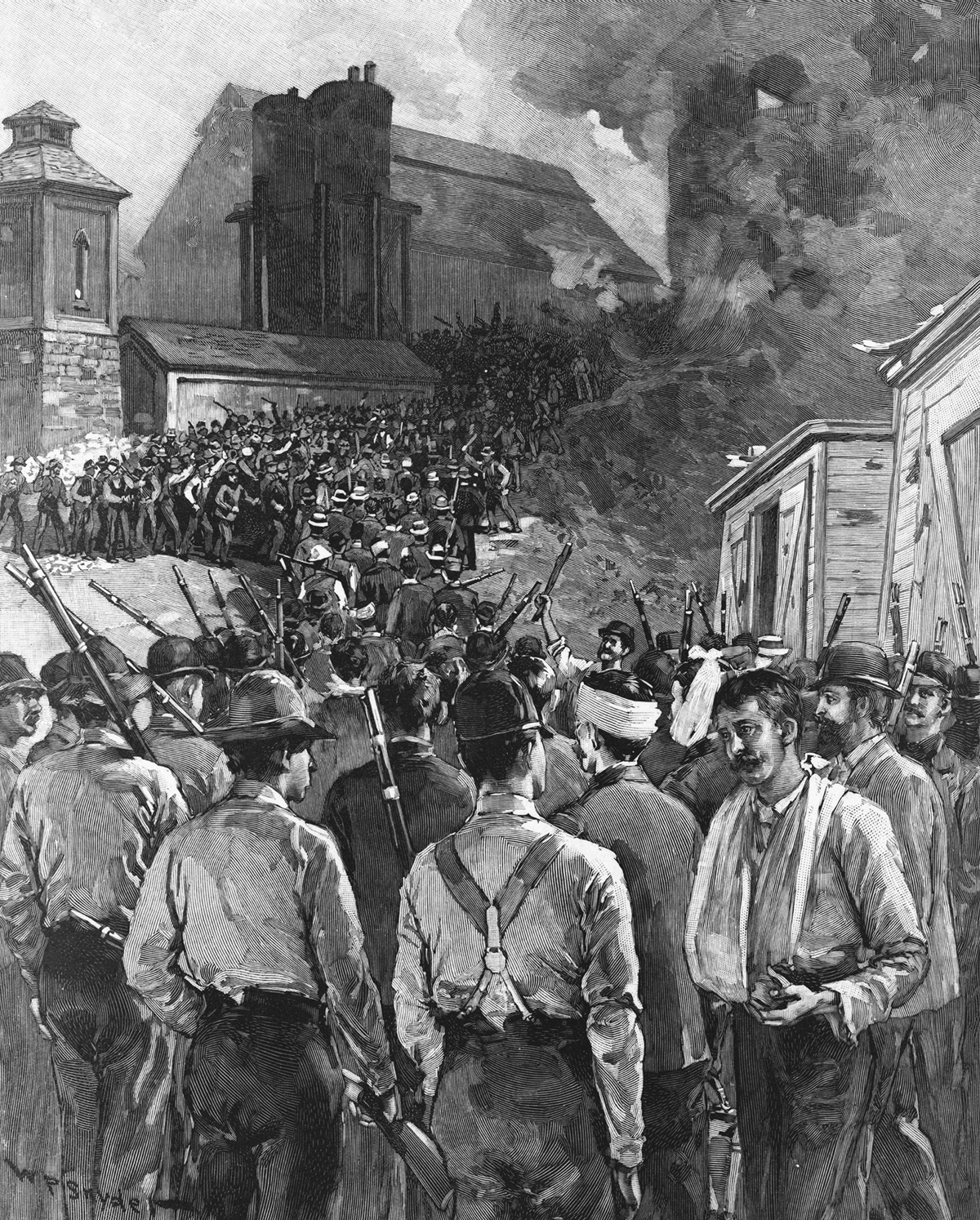 A large crowd of workers armed with rifles and clubs menacingly line a road as a crowd of men, many of them wounded, look anxiously on.