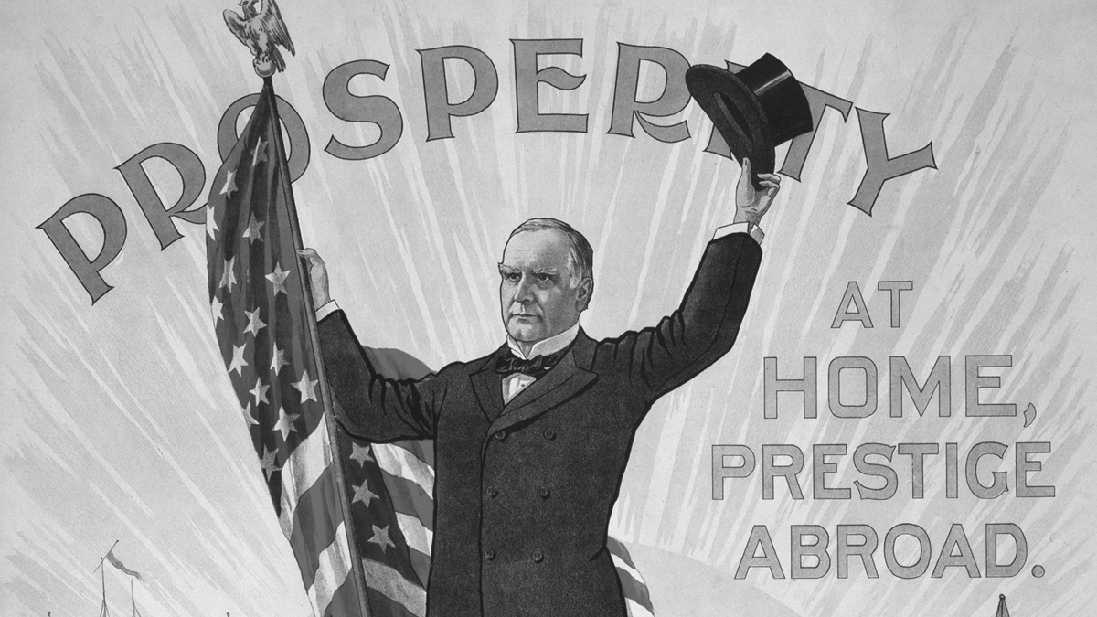 A bright poster with a man in a suit holding his top hat in the air in one hand and an American flag in the other, in front of a bright sunrise.