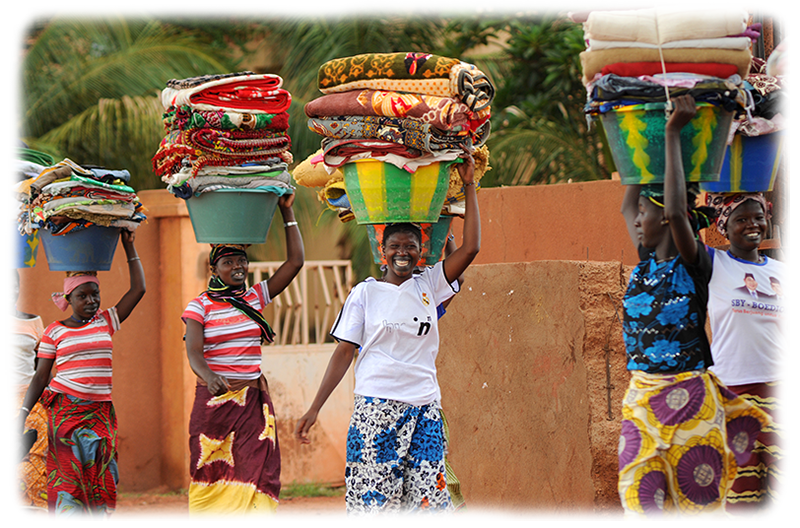 Women carrying baskets on their heads