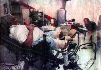 photo of user exercising on a therapeutic bicycle