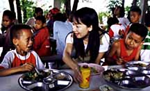 Photo of Agnes Chan with children