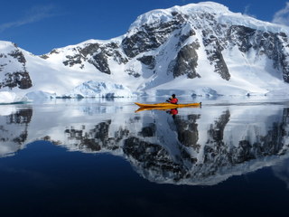 Deb kayaking at
              Danco Island