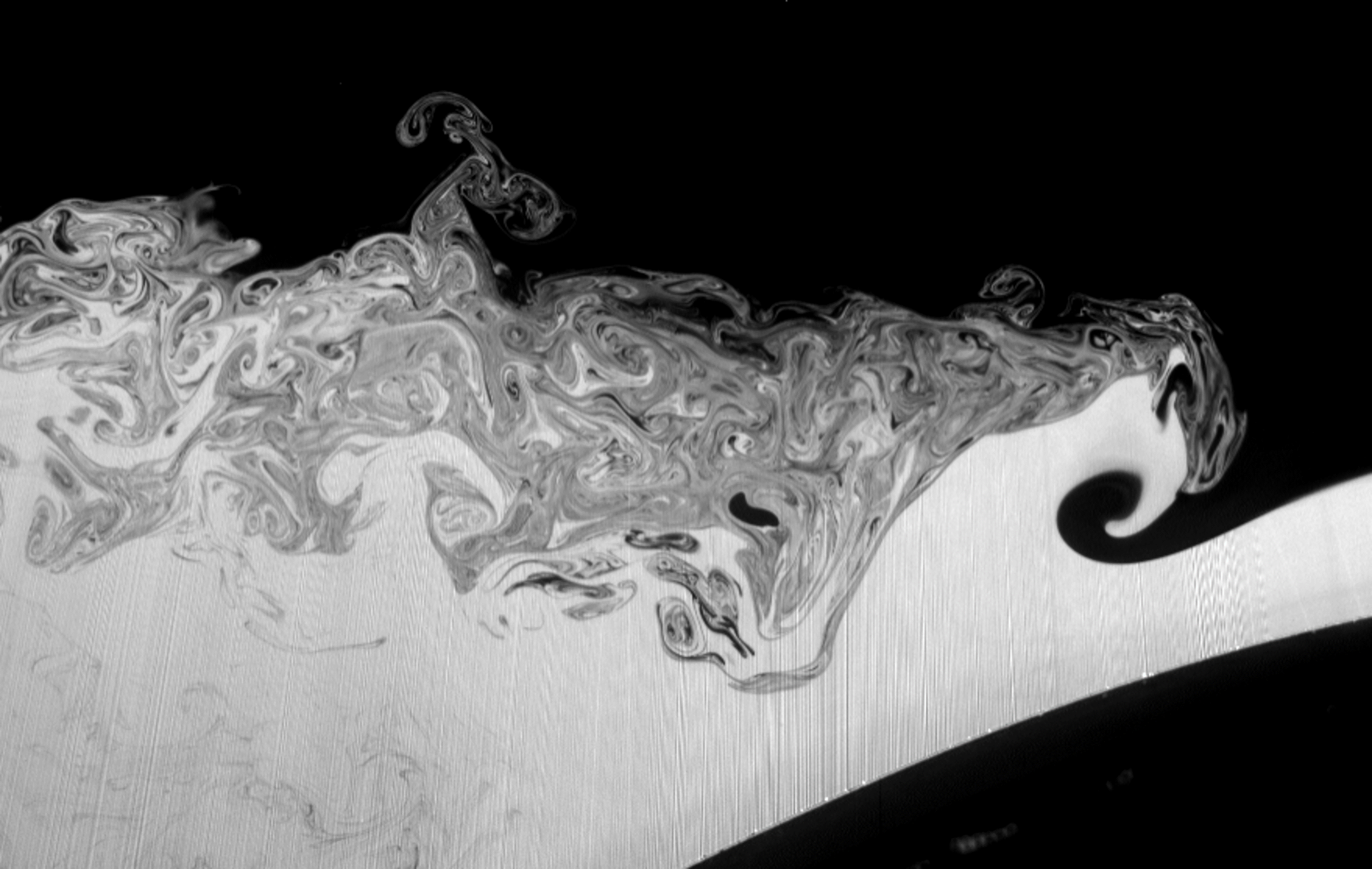 Breaking internal waves in a laboratory tank